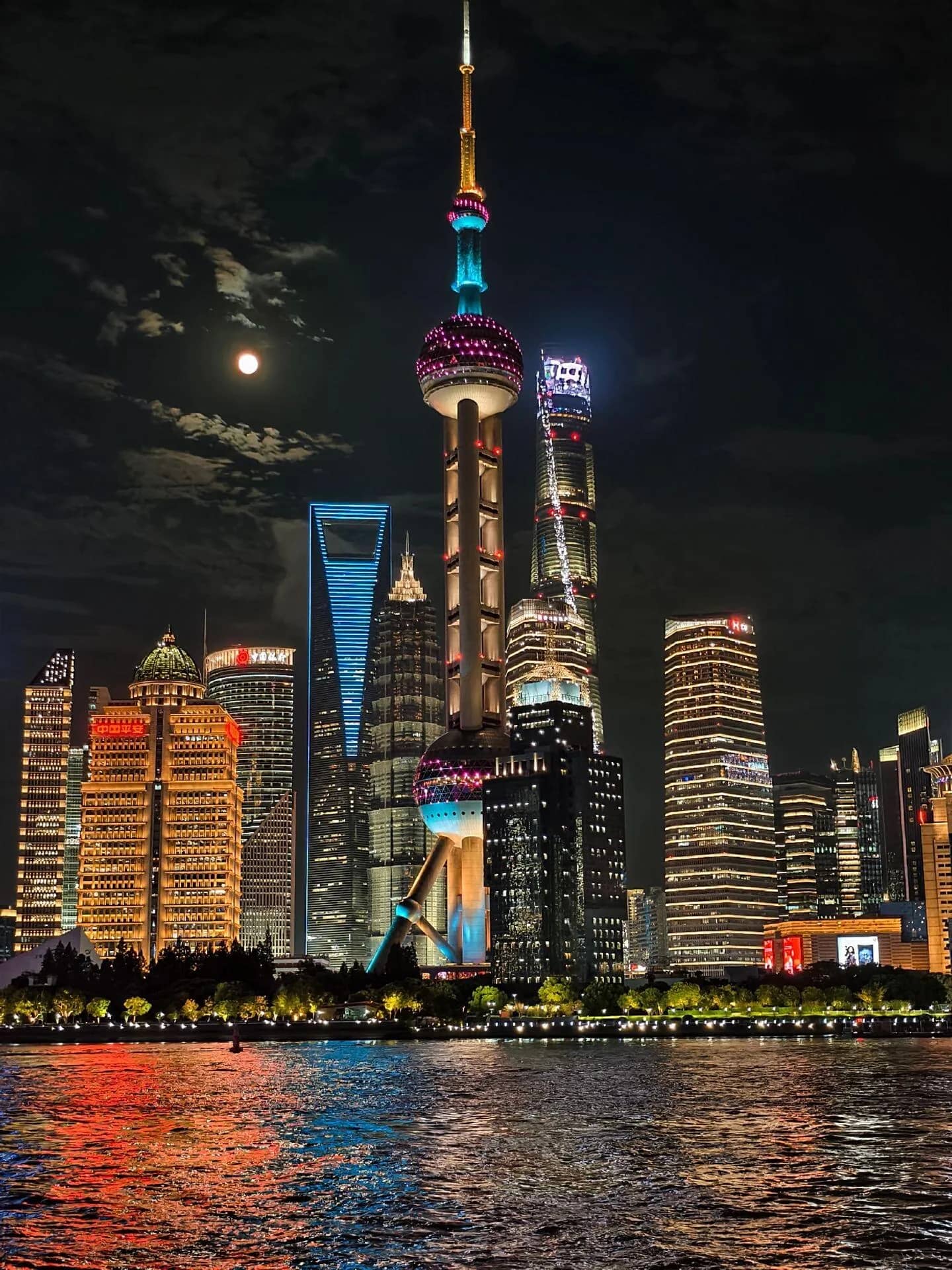 Shanghai's illuminated Pudong skyline seen across the Huangpu River