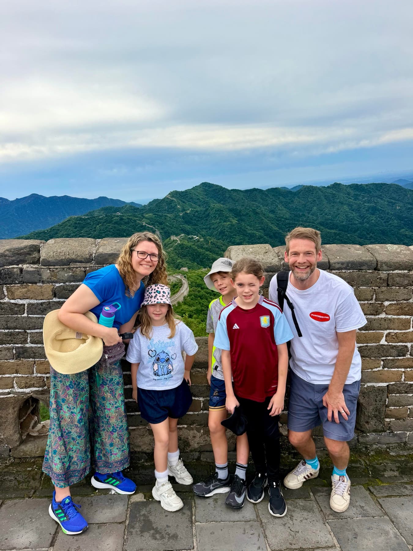A family enjoying a private visit to the Great Wall of China
