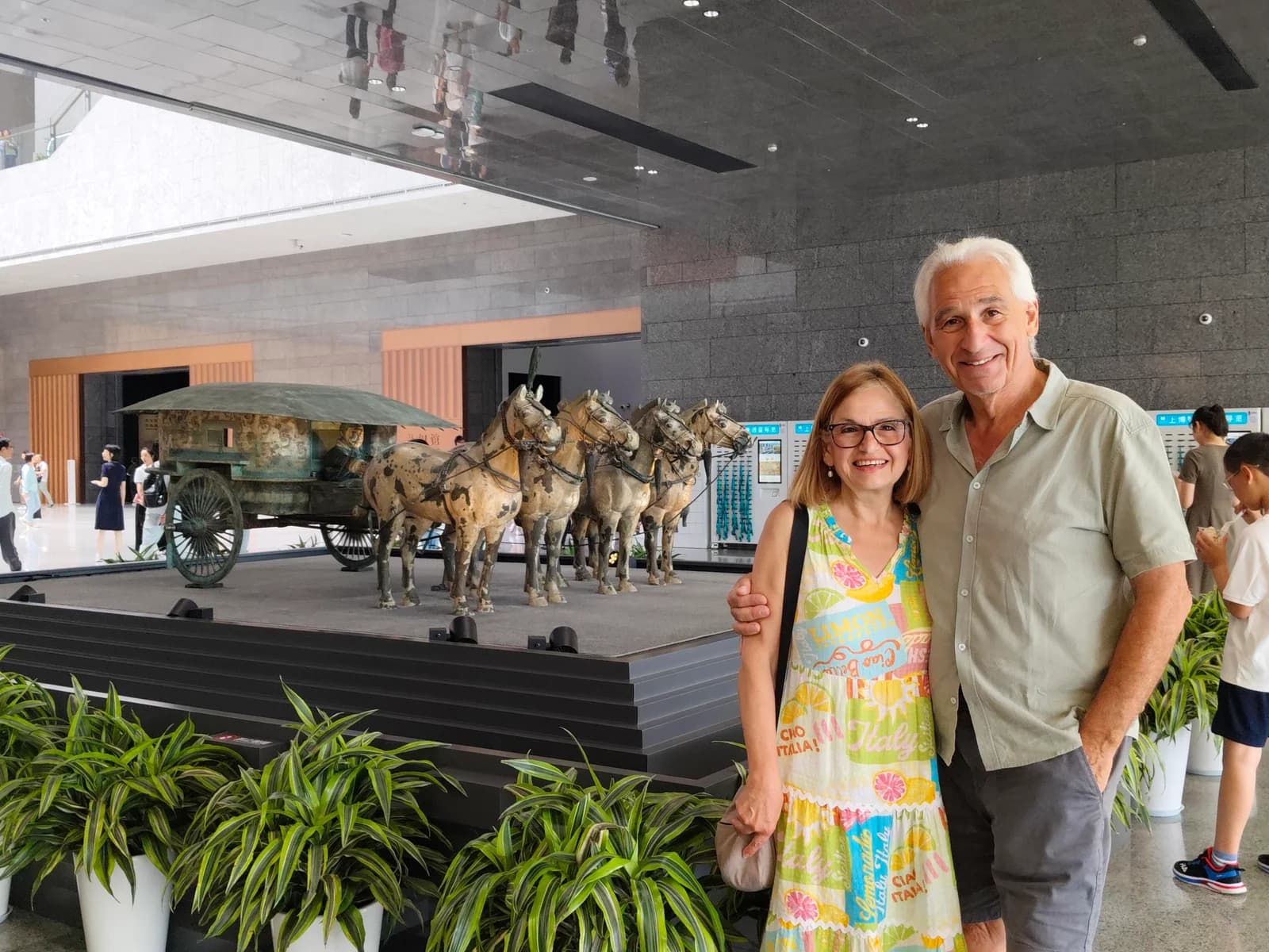 Older travelers exploring a museum gallery in Shanghai with a private guide