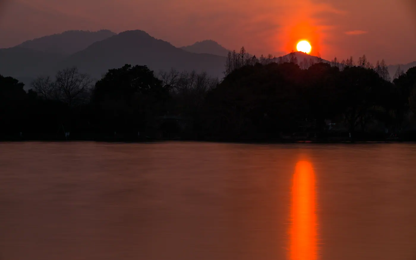 Warm sunset over West Lake in Hangzhou