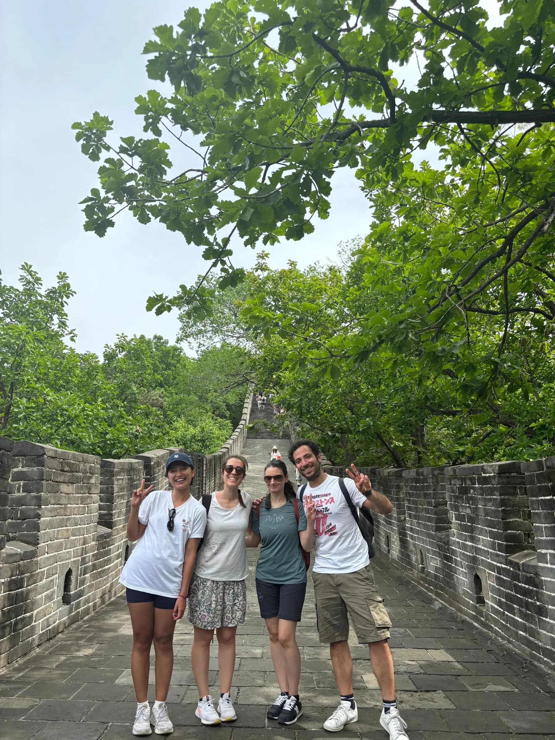 Travelers with their English-speaking guide on the Great Wall near Beijing