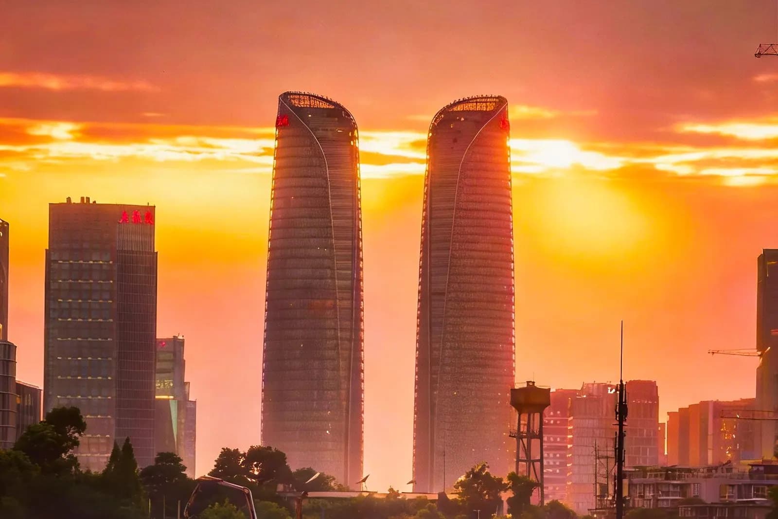 Chengdu's skyline beneath a warm evening sky