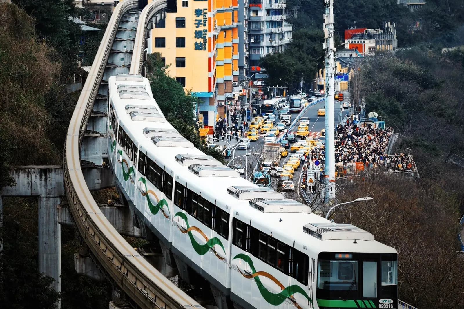 A monorail passing through a building at Liziba in Chongqing