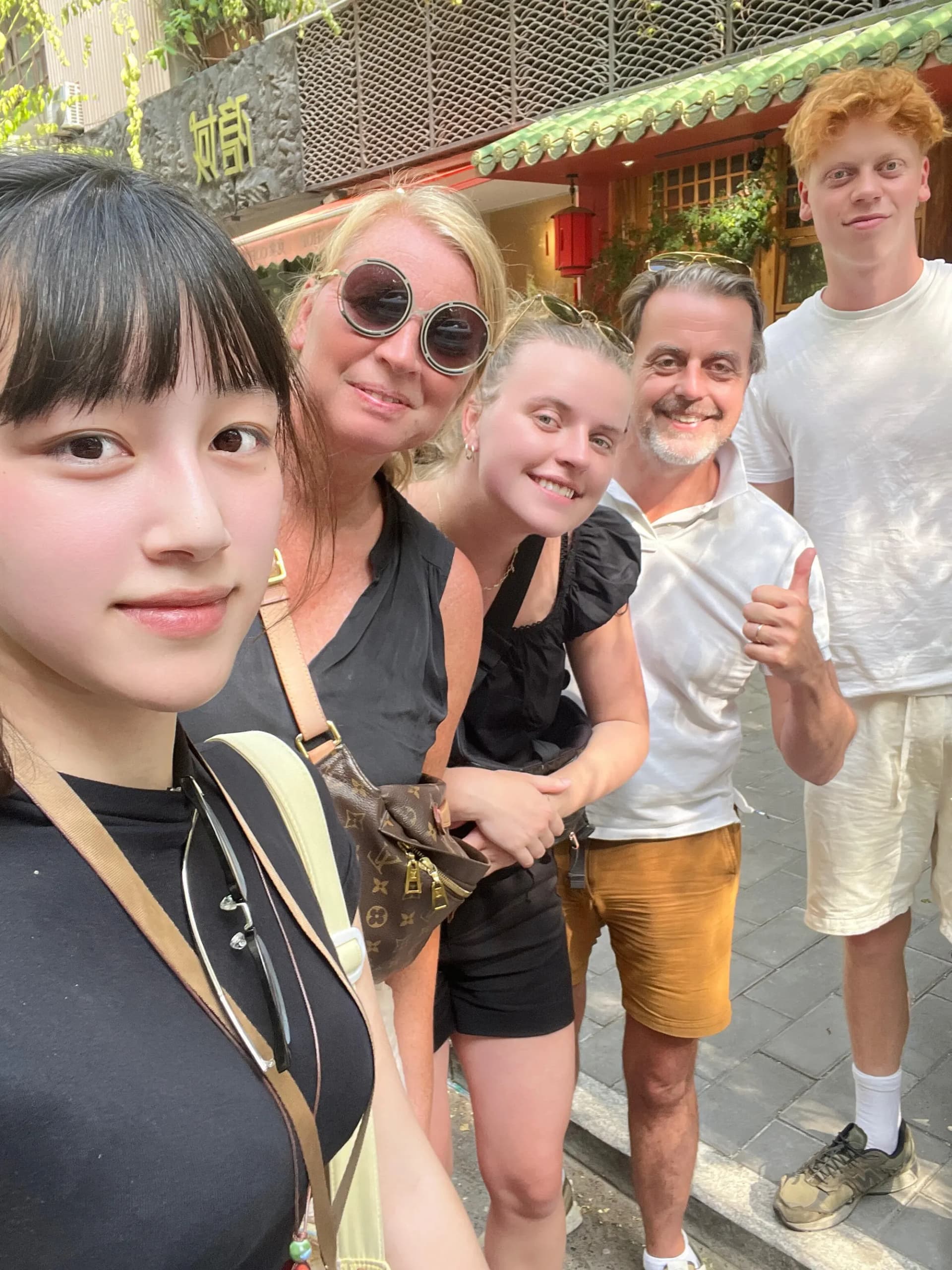 An AVIORA local guide with a family traveling together in China