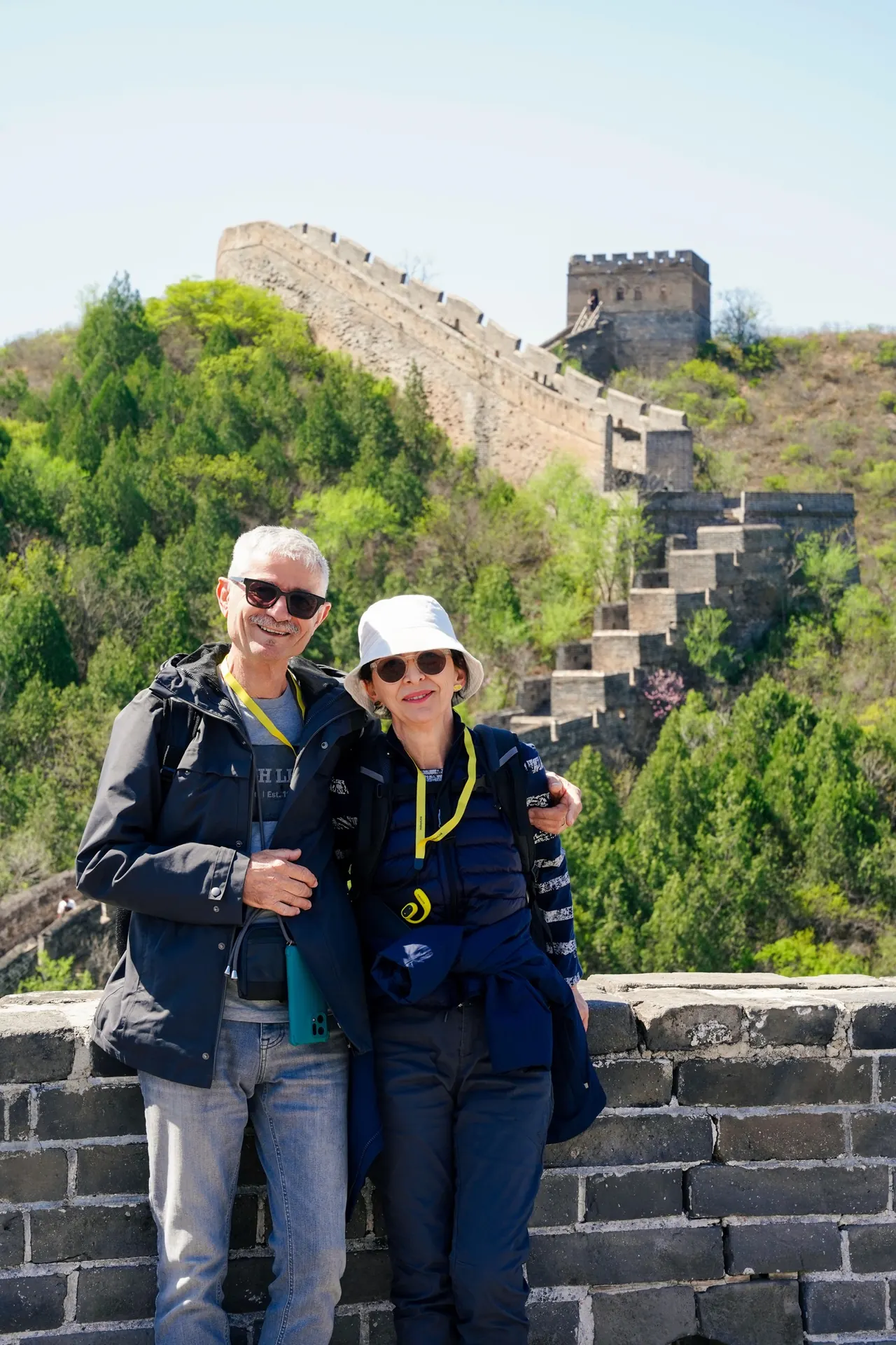 Two mature travellers enjoying a measured visit to the Great Wall near Beijing
