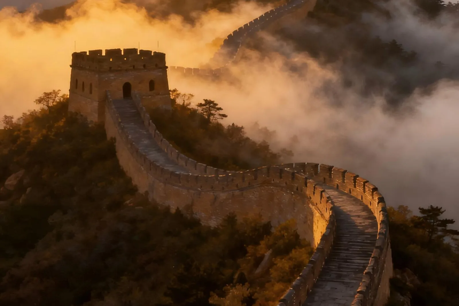 The Great Wall rising above the mountains near Beijing in warm evening light