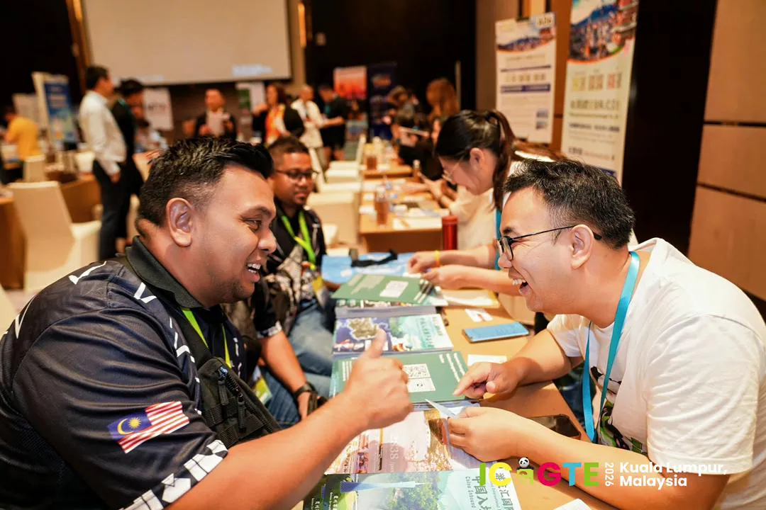The AVIORA China team speaking with international travel buyers in Malaysia