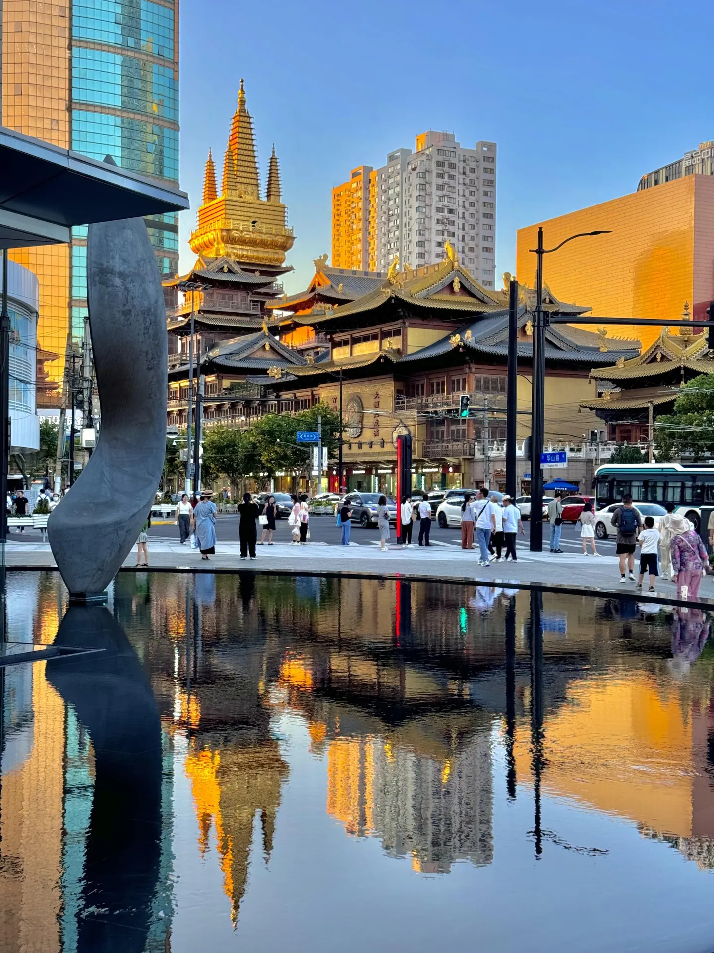 A Shanghai temple framed by the city's modern skyline