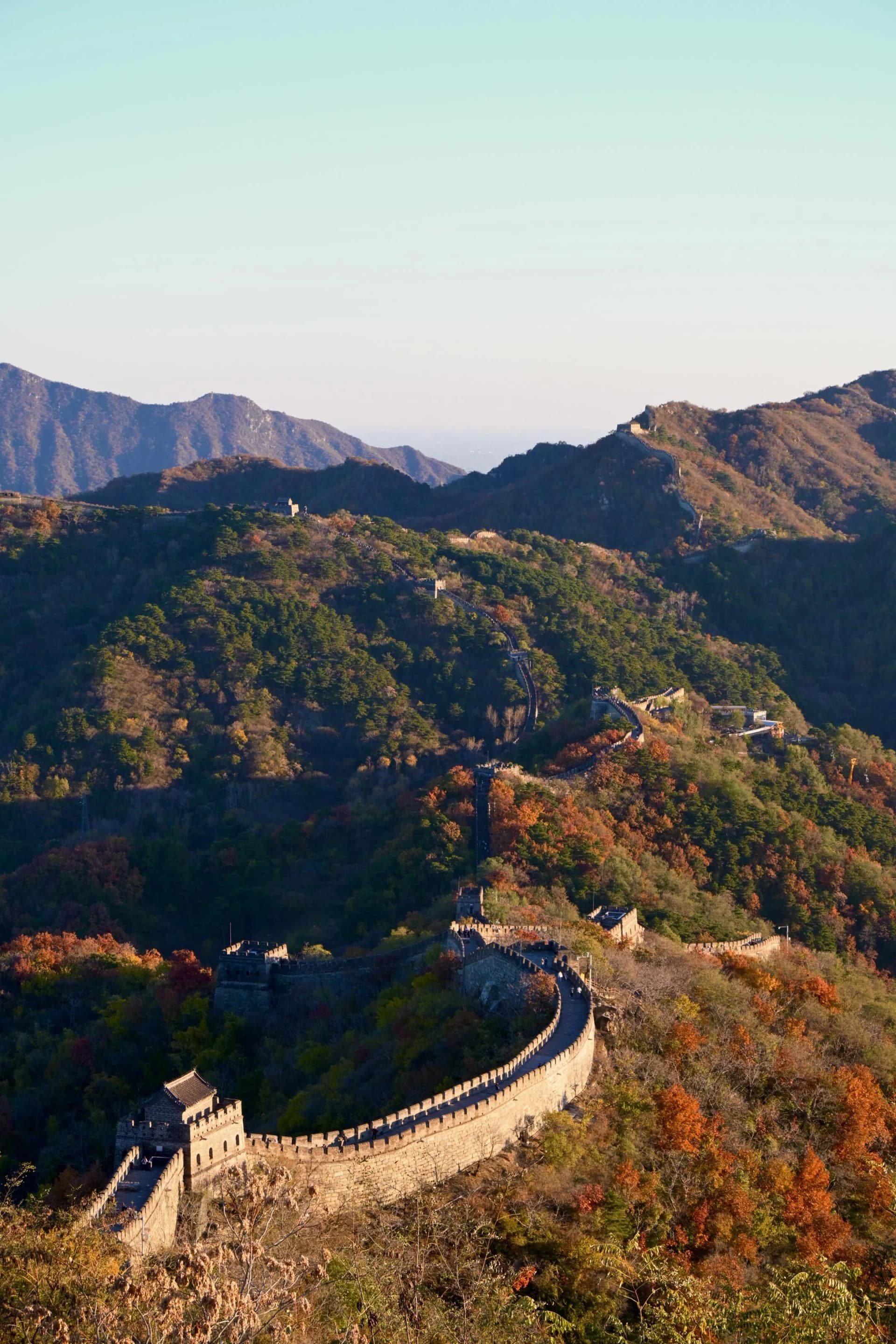 Mutianyu Great Wall winding through autumn-colored mountains near Beijing