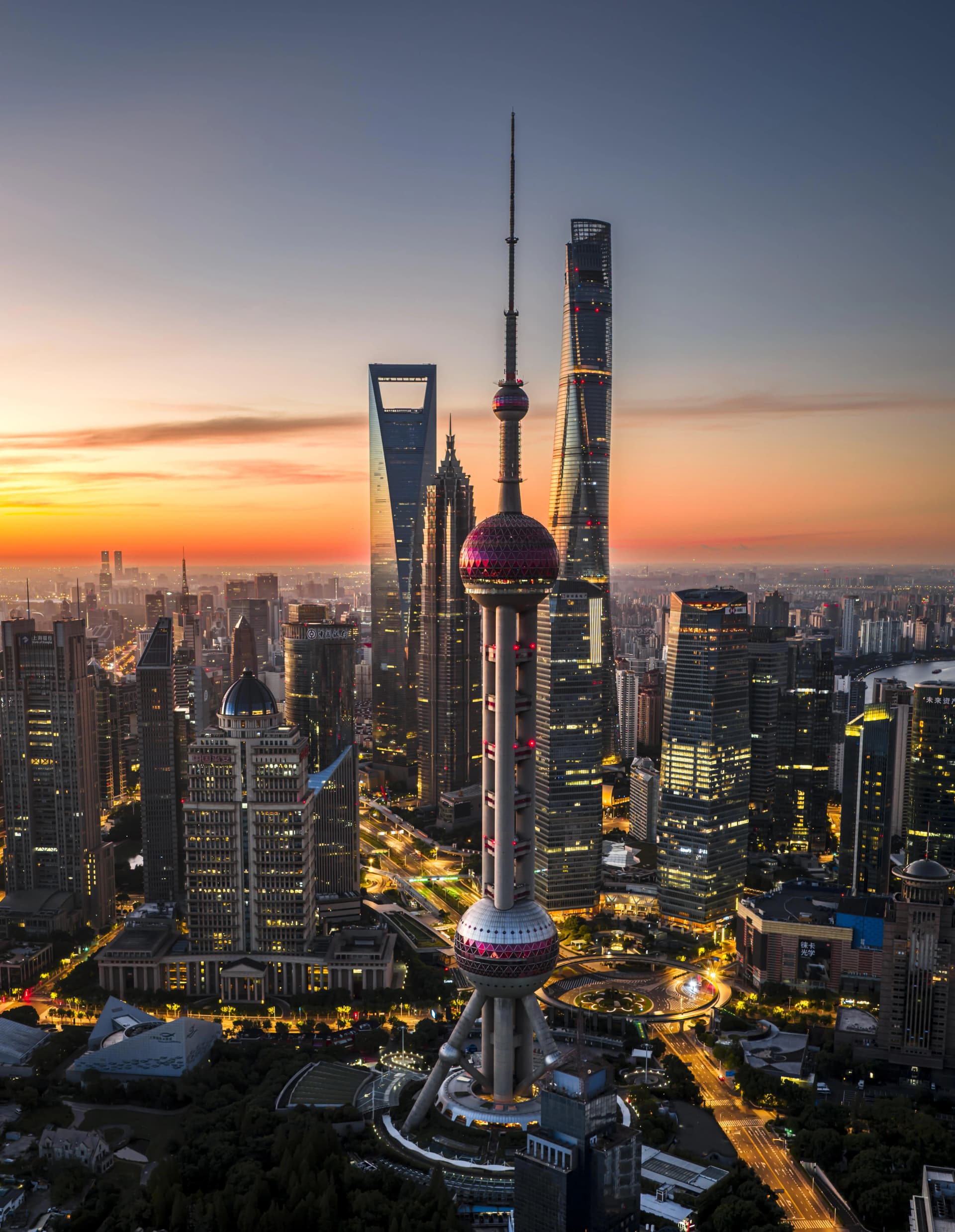 Lujiazui skyline at dusk, with the Oriental Pearl Tower and Shanghai Tower