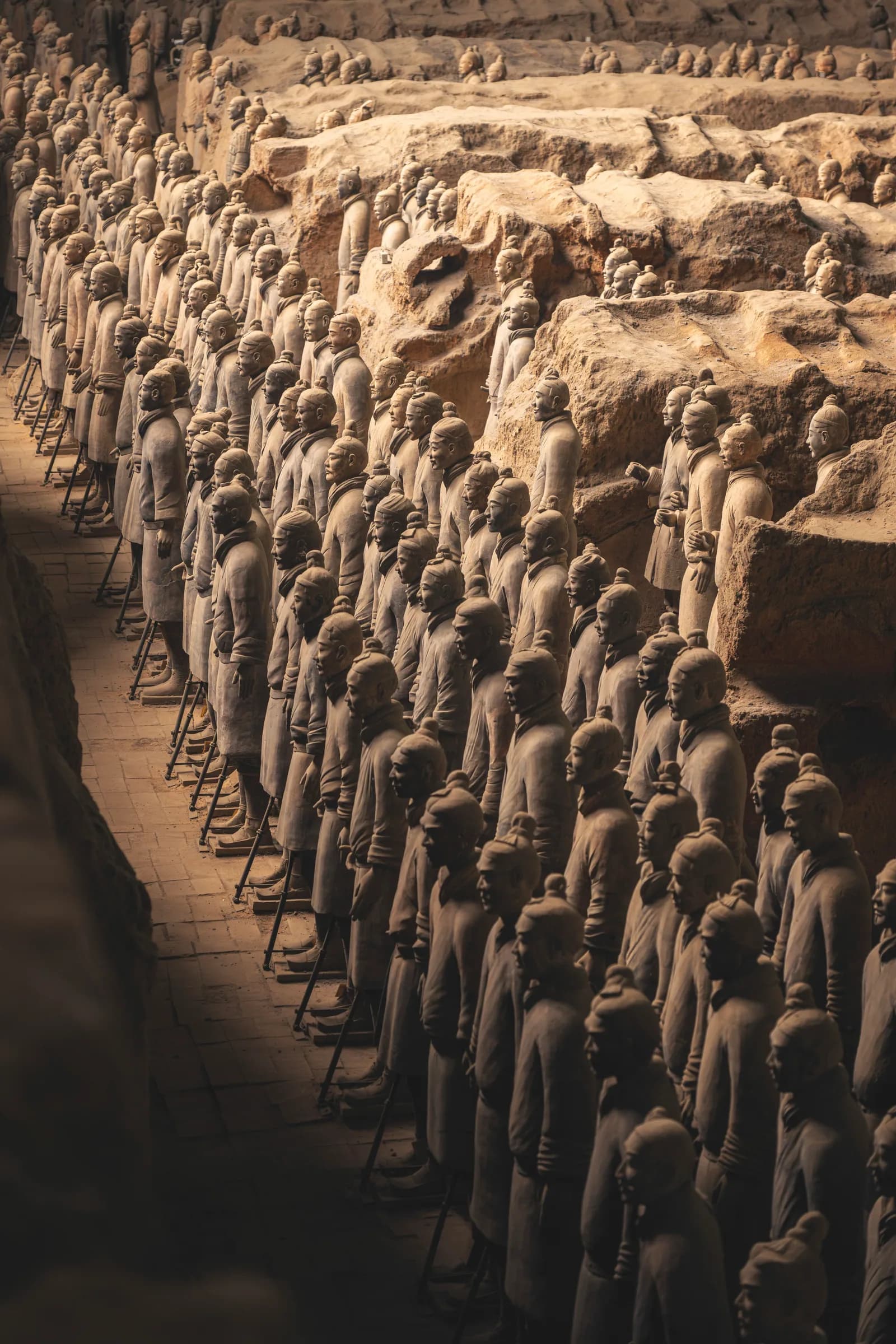 Rows of life-sized Terracotta Warriors inside the Qin emperor's mausoleum pits in Xi'an