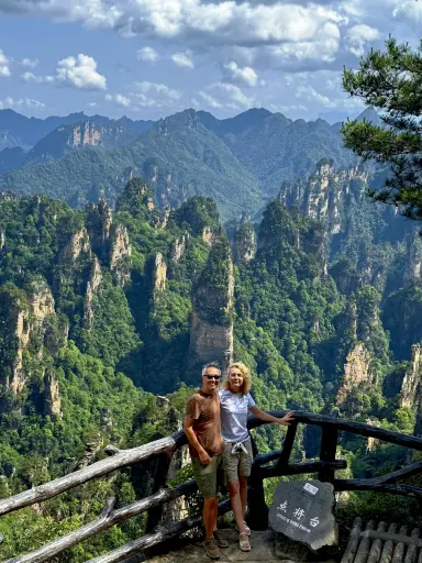 Travelers looking across the sandstone pillars of Wulingyuan in Zhangjiajie